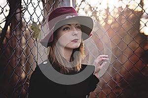 Woman with long hair, fedora hat