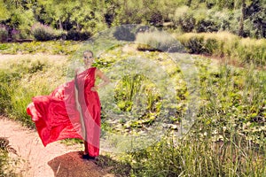 Woman in a long red dress