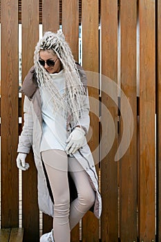 Woman With Long White Hair Wearing Fur Coat