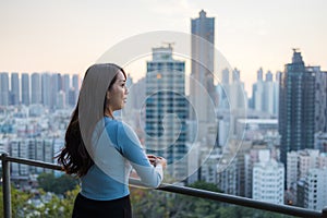 Woman look at city view on mountain