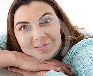 Woman look. Friendly smiling middle-aged woman at home