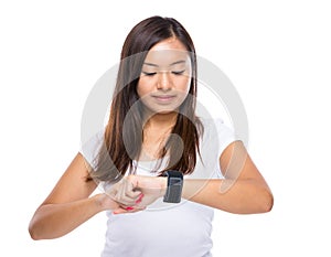 Woman look at smart watch