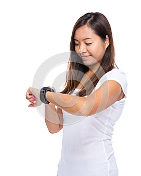 Woman look at smart watch