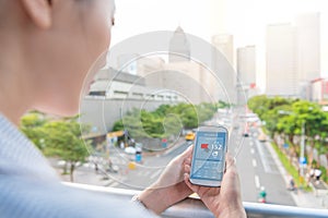 Woman looking at air quality index app