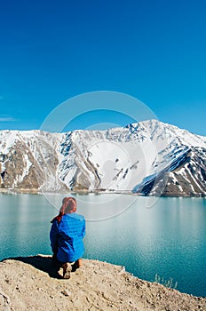 Woman looking away from the camera in Embalse El Yeso photo