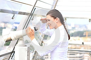 Woman looking through binoculars