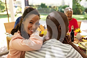 Woman looking at camera and smiling