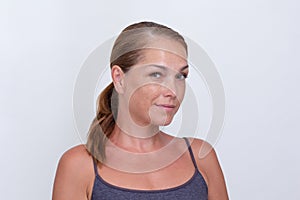 Woman looking at camera on white background
