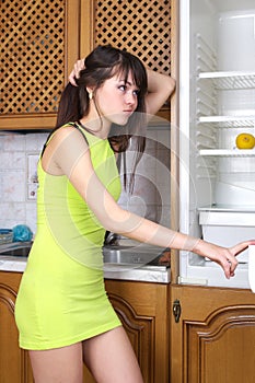 Woman looking in the fridge