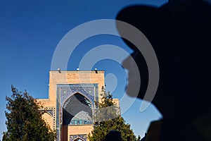 Woman looking at Gur Emir Mausoleum in Samarkand