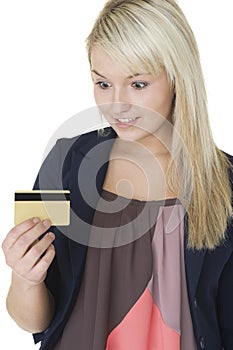 Woman looking at her credit card