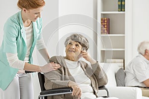 Woman looking at her nurse