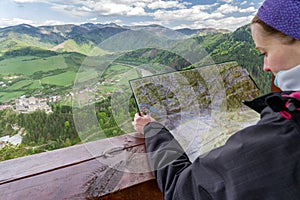 Woman looking from lookout Spicak, Slovakia