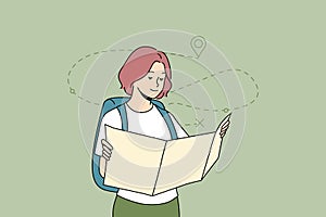 Woman looking at map planning trip