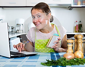 Woman looking for new recipe