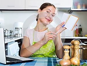 Woman looking for new recipe