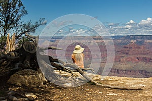 A woman looking out over the Grand Canyon