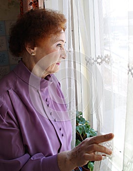 Woman looking outside