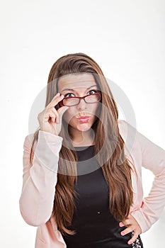 Woman looking over top of glasses