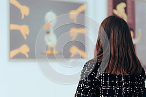 Woman Looking at a Painting in an Art Gallery