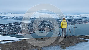 Woman looking at panorama Tromso