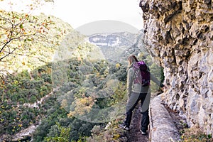 Woman looking the precipice