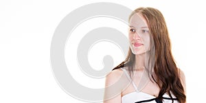 Woman looking side blank copy space long hair sexy pose in studio portrait in white background