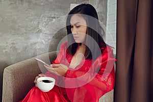 Woman looking at a smartphone