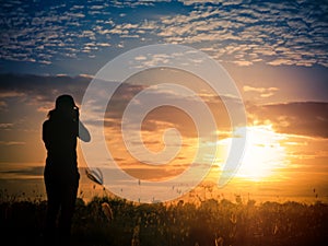 Woman looking at sunset