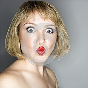 Woman looking surprised.