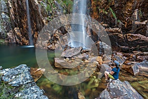 Woman looking to Parida Waterfall (Cachoeira da Parida)