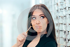 Woman Looking To Replace Old Lorgnette Glasses with New Pair