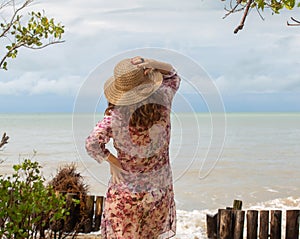 The woman looking to the sea