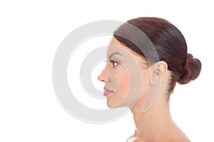 Woman looking to side in profile view showing clean skin fresh face