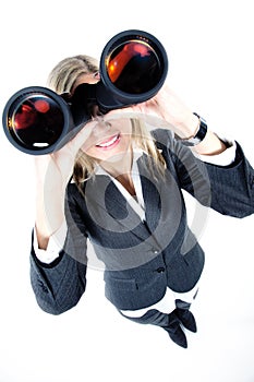 Woman looks through a binoculars