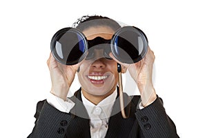 Woman looks through binoculars and found business