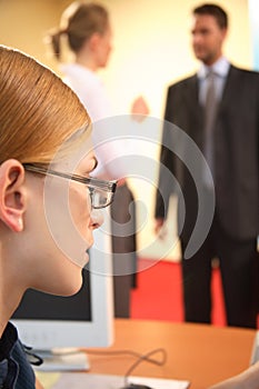 Woman looks on during a conversation