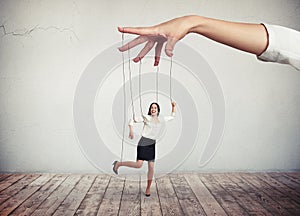 Woman looks like a puppet on strings