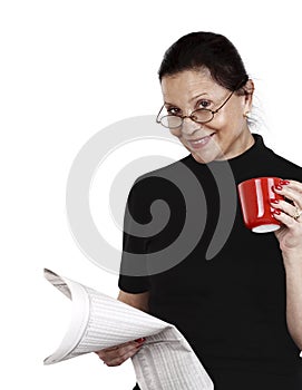 Woman looks at newspaper