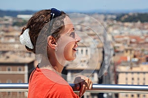 Woman looks at Rome from Altar of Fatherland photo