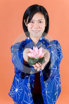 Woman with lotus blossom