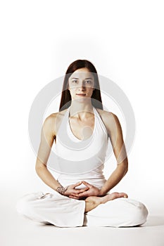 Woman in lotus Yoga posture (Padmasana) photo