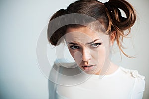 The woman lours with mistrust