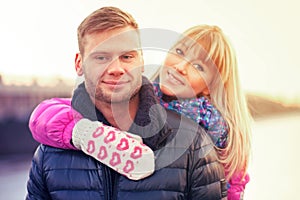 Woman in lovely mittens and her boyfriend