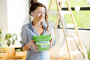 Woman with lunch boxes