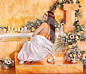 Woman at luxury spa.