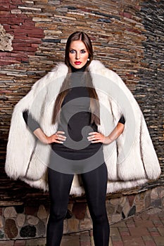 Woman in Luxury white Fur Coat