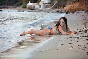 Woman lying at beach