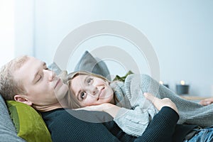 Woman lying on man`s chest
