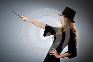 Woman magician doing her tricks